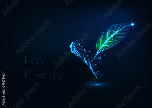 Futuristic glowing low polygonal check mark with green leaf isolated on dark blue background.