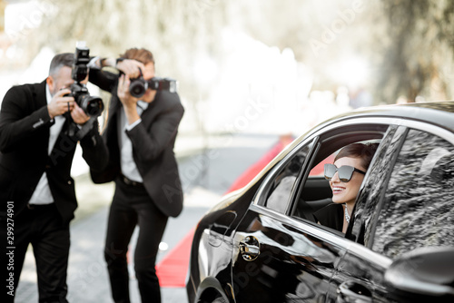 Photo reporters photographing actress ariving on the awards ceremony