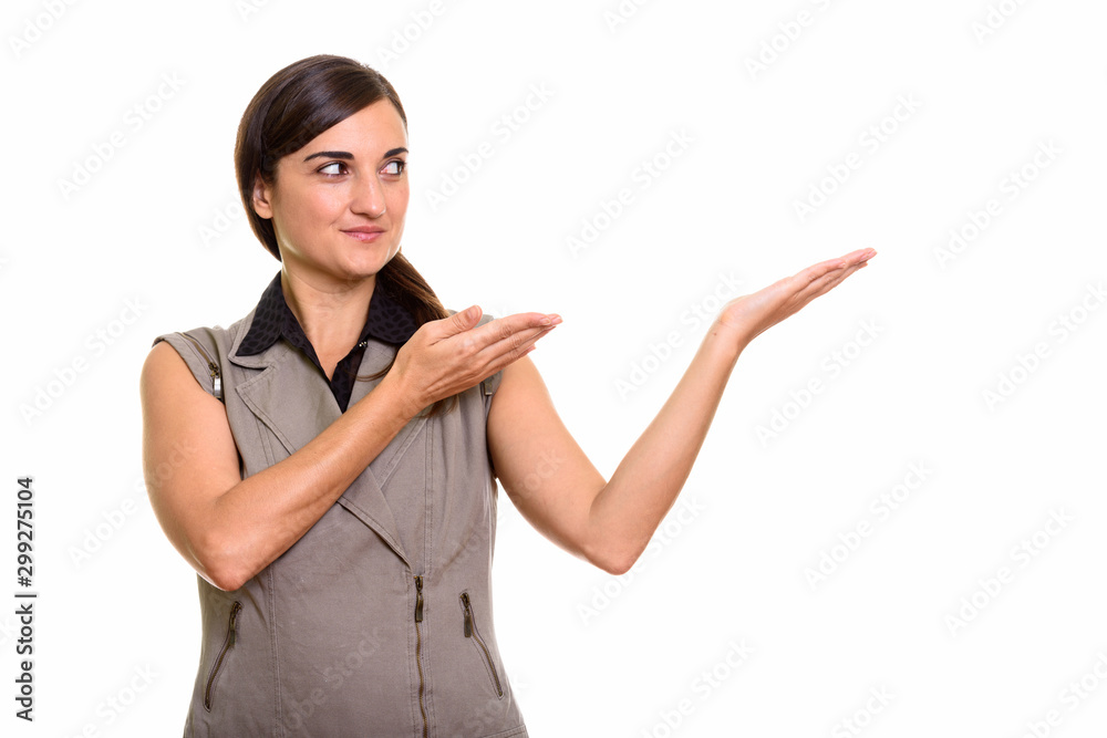 Portrait of young beautiful businesswoman showing something Portrait of young beautiful businesswoman showing something