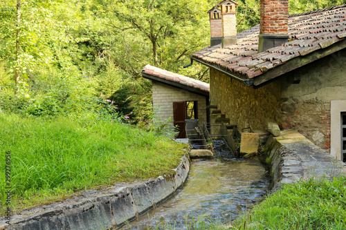 Ruscello nel bosco sul sentiero delle meraviglie che porta al mulino del maglio, Canton Ticino  photo
