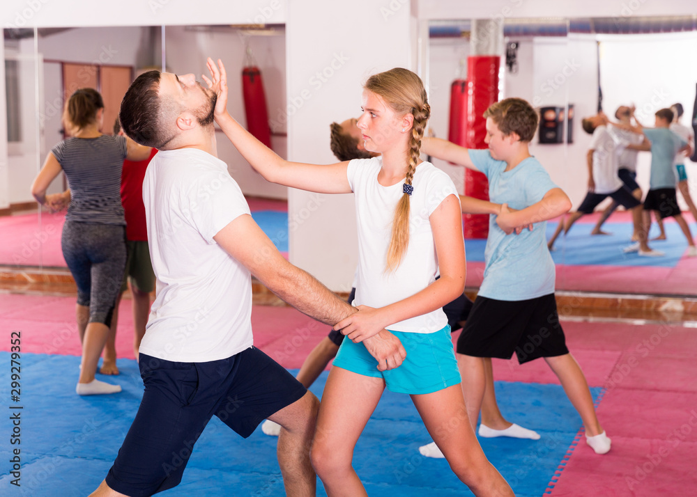 Kids exercising self-defense movements