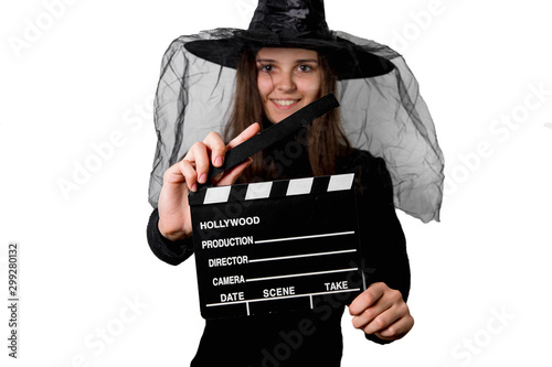 Czarownica z klapsem filmowym. Halloween.