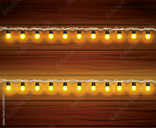 merry christmas bulbs lights in wooden background