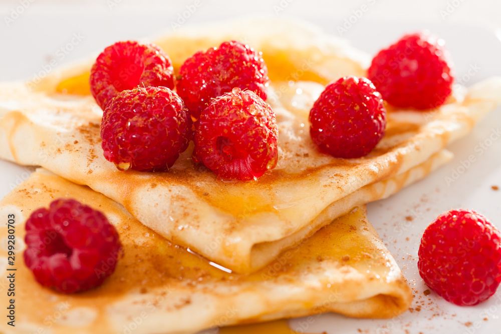 delicious pancakes with fresh raspberries and honey delicious pancakes with fresh raspberries and honey