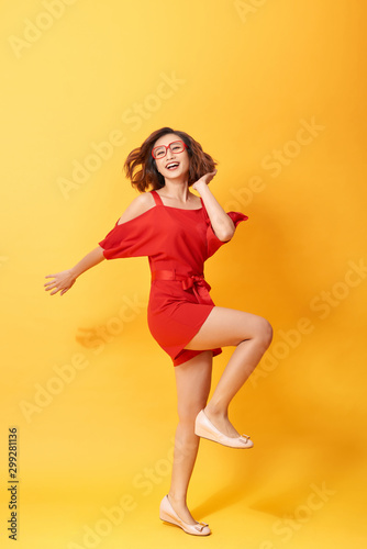 Full length body size photo of pretty charming gorgeous lovely sweet dancing isolated vivid background