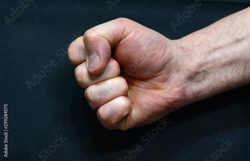 Mans clenched fist image