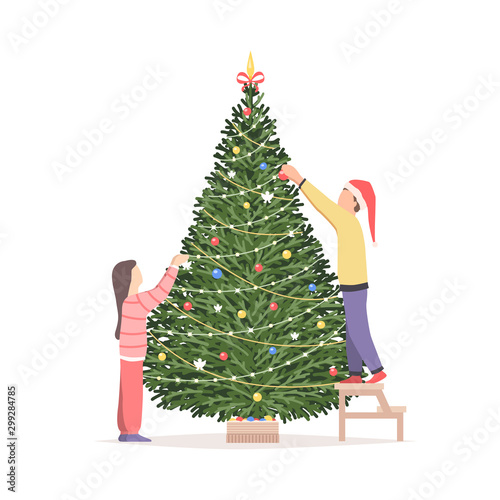 Children decorate the Christmas tree
