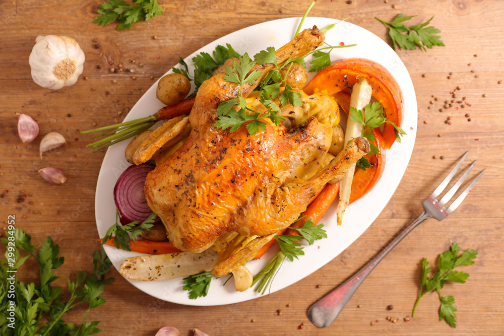 grilled chicken with vegetable on wood background grilled chicken with vegetable on wood background