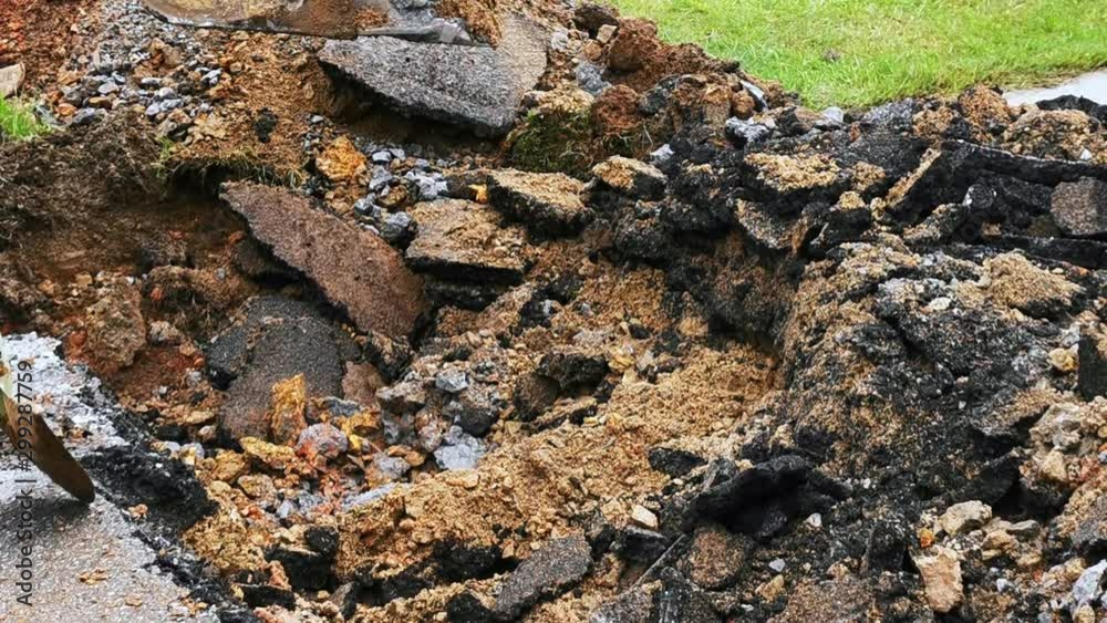 Backhoe digging leaking water pipes Backhoe digging leaking water pipes