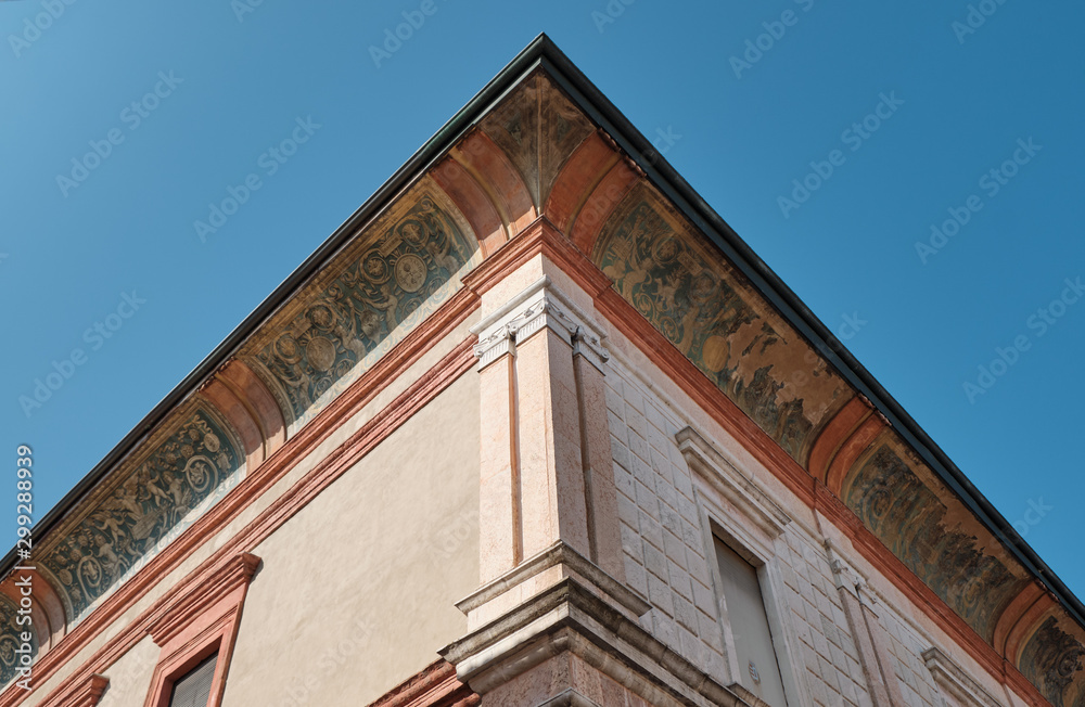 ancient building with decorated facade in the city of Cremona.