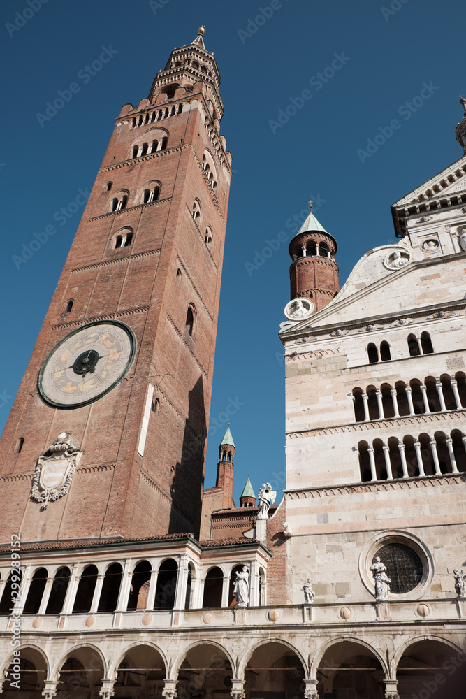 Cremona Cathedral with the adjoining baptistery and famous Torrazzo bell tower- market square Piazza Duomo, Lombardy, Italy.