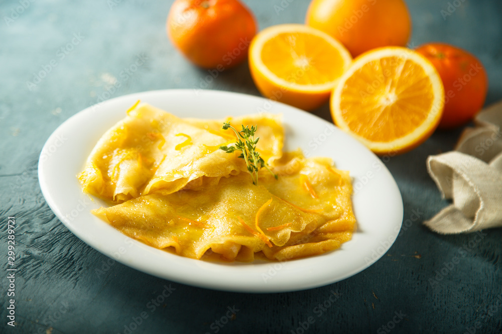 Homemade crepes with orange sauce Homemade crepes with orange sauce
