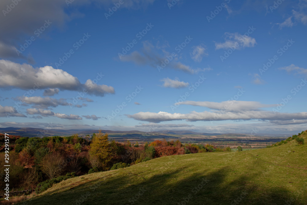 Looking from Finavon Hill and north over the Strathmore Valley, with the Tree Foliage beginning to display its Autumn Colours on an October Day