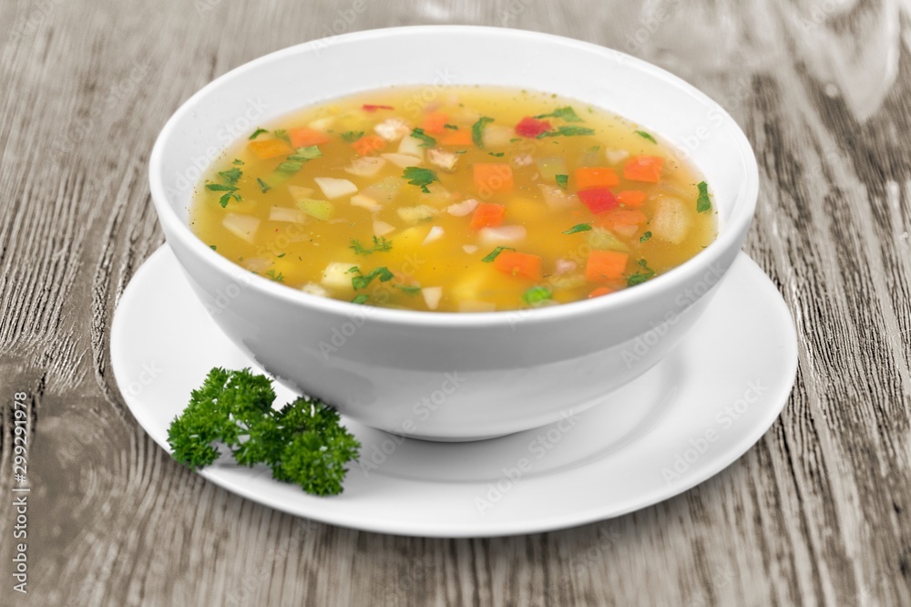 Bowl of vegetables delicious soup, close-up view Bowl of vegetables delicious soup, close-up view