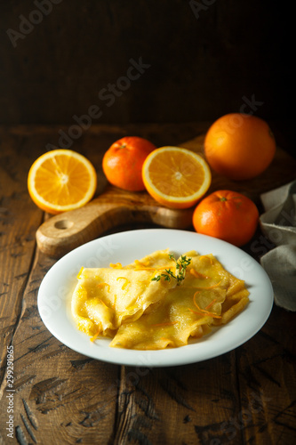 Homemade crepes with orange sauce