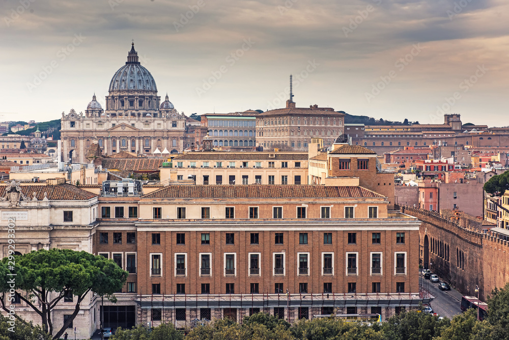 Rome rooftop city view on Vatican and dome St. Peter's cathedral. Italy