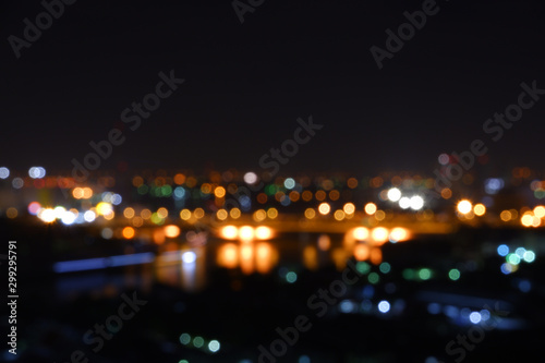 Abstract blurred circle bokeh lights backgrounds, Colorful bokeh of city night light © Phatthaya