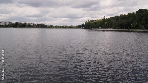 view of the city lake on a cloudy day photo