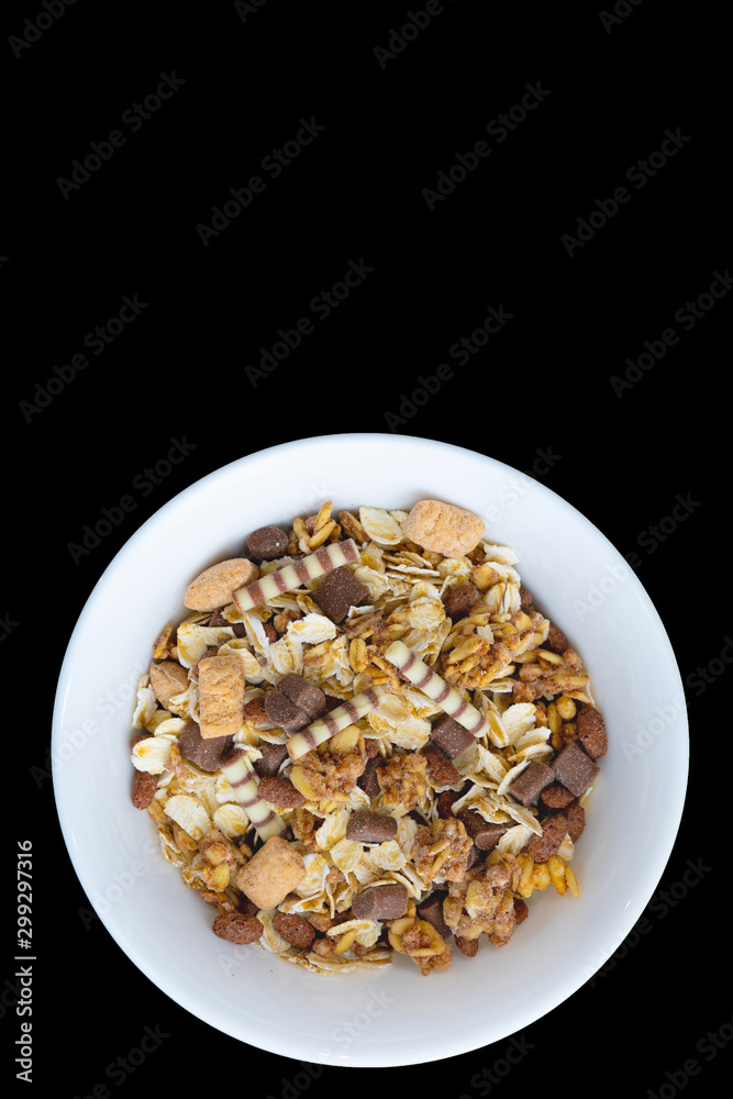 Variety of cold cereals in white bowls, quick breakfast for kids overhead shot with copyspace Variety of cold cereals in white bowls, quick breakfast for kids overhead shot with copyspace