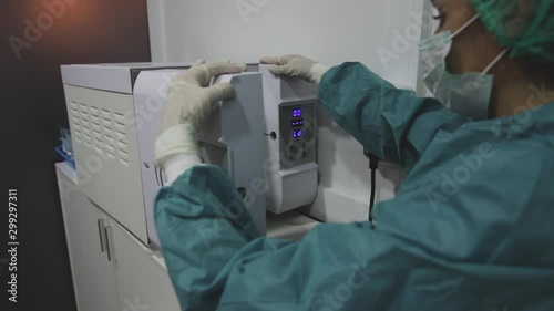 veterinarian removing sterile material 