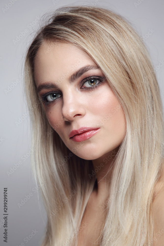 Portrait of young beautiful blonde girl with smoky eye makeup Portrait of young beautiful blonde girl with smoky eye makeup
