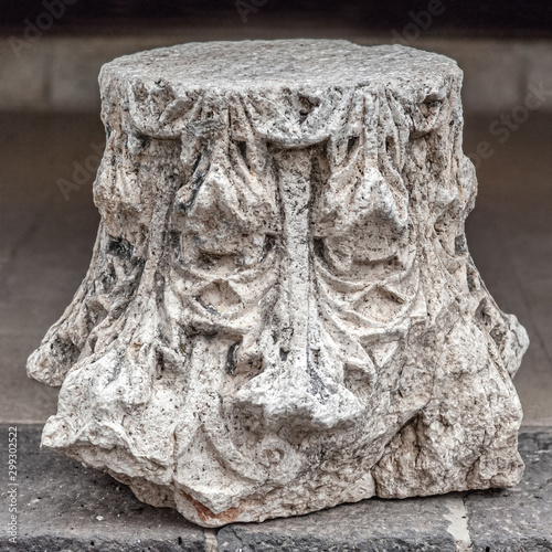 capital of an ancient column close up