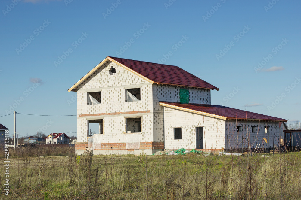 Development of land plot. Under construction house of aerated concrete blocks. Russia Development of land plot. Under construction house of aerated concrete blocks. Russia