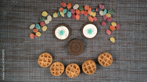cookies and candy face flatlay