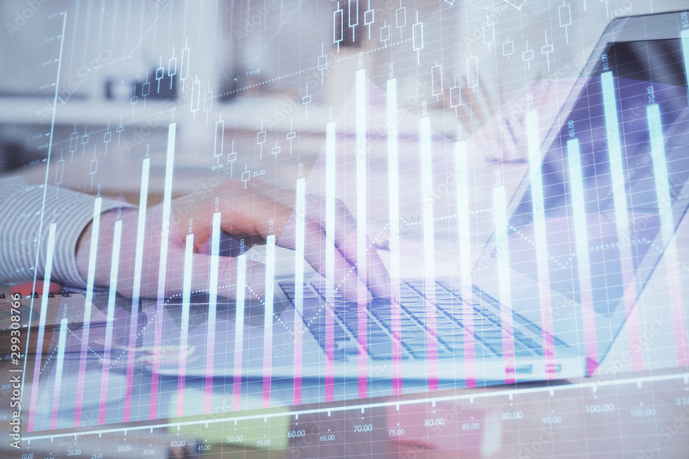 Double exposure of stock market graph with man working on laptop on background. Concept of financial analysis. Double exposure of stock market graph with man working on laptop on background. Concept of financial analysis.