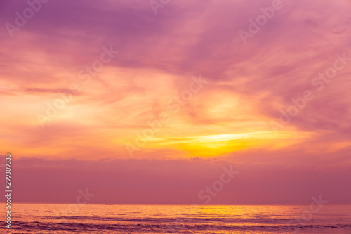 Sunset over the sea. Atlantic ocean in the evening. Beautiful sunset with dramatic sky