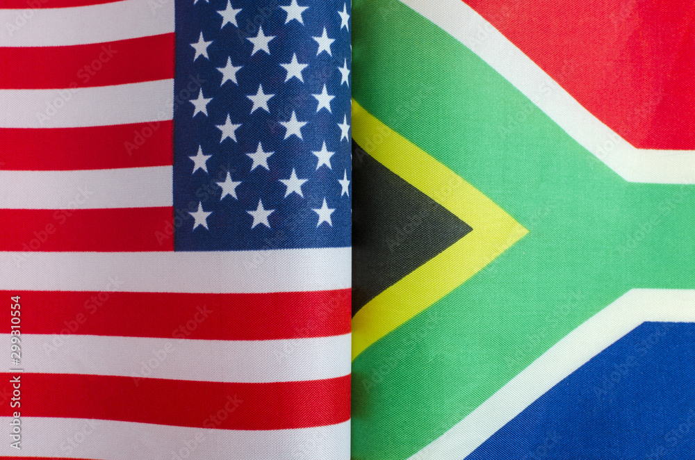 national flags of the USA and South Africa close up concept national flags of the USA and South Africa close up concept