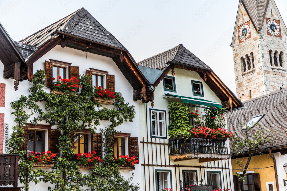Hallstadt, Austria - July, 2019: Beautiful houses of Hallstadt, Austria. Tourist destinations.