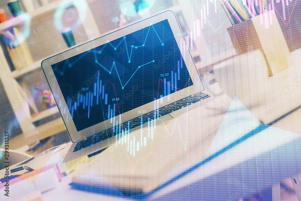 Financial market graph hologram and personal computer on background. Double exposure. Concept of forex. Financial market graph hologram and personal computer on background. Double exposure. Concept of forex.