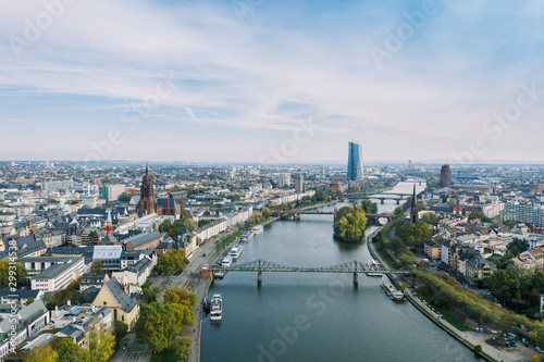 Frankfurt am Main Aerial view with drone. Looking towards the central bank. Main river flowing near Frankfurt. Frankfurt am Main Germany 30.10.2019 © Tudorean