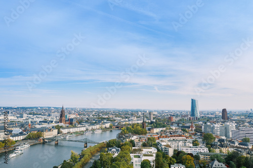 Frankfurt am Main Aerial view with drone. Looking towards the central bank. Main river flowing near Frankfurt. Frankfurt am Main Germany 30.10.2019 © Tudorean