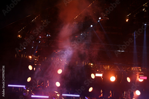 Purple light on a rock concert stage as background © schankz