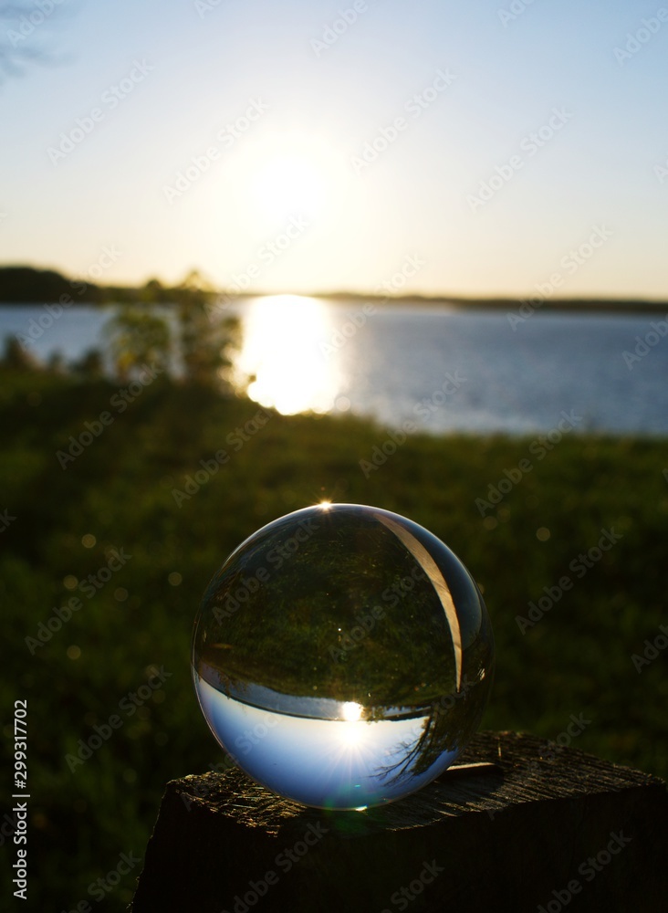 Reflection of Belmont Bay during sunset in glass orb Reflection of Belmont Bay during sunset in glass orb