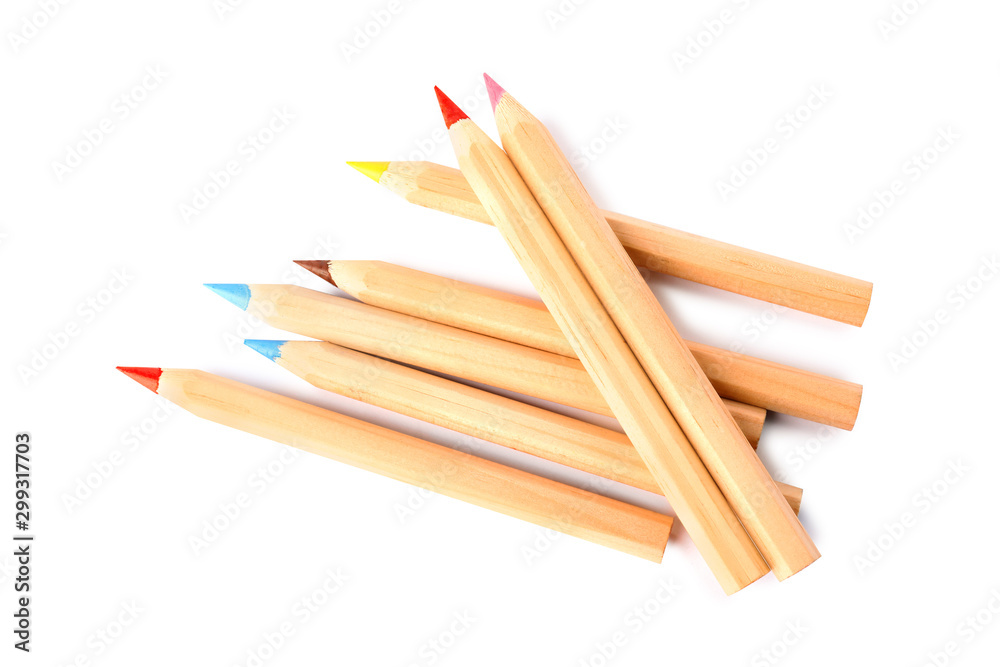 Different color pencils on white background, top view. School stationery Different color pencils on white background, top view. School stationery