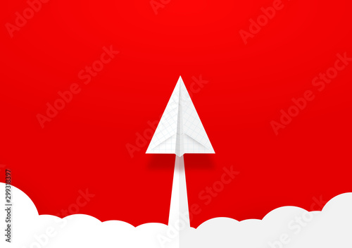 Paper Rocket or airplane launch. Concept of business start-up, boost or success. photo