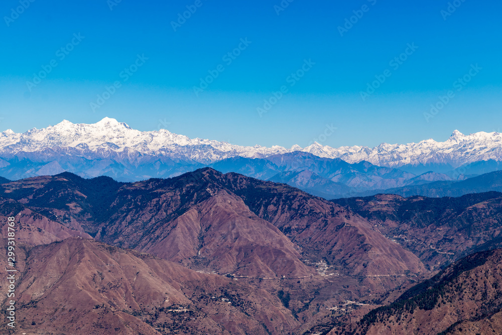 huge mountains snowy mountain peaks of the Garhwal Himalayas namely Banderpooch, Swargrohini, Gangotri Group, Yamunotri and Nanda Devi are clearly visible from here.