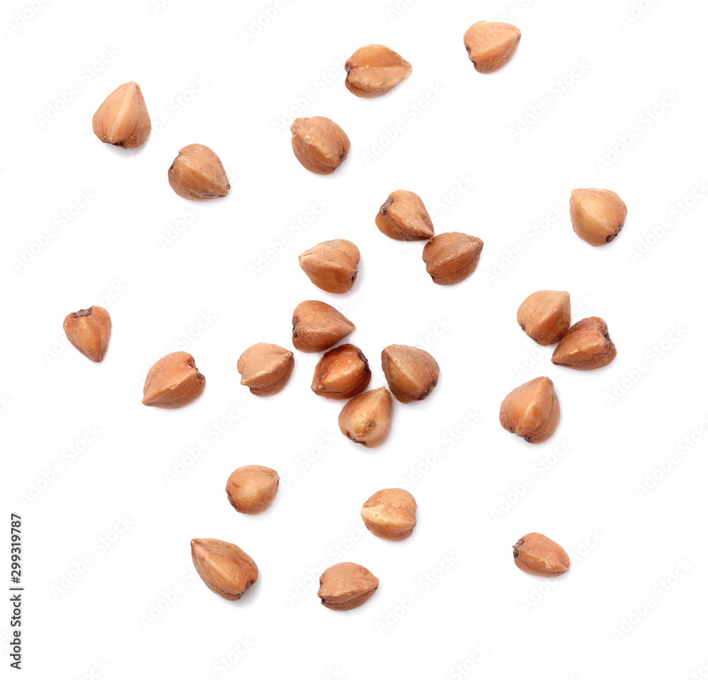 Buckwheat grains isolated on white, top view. Organic cereal