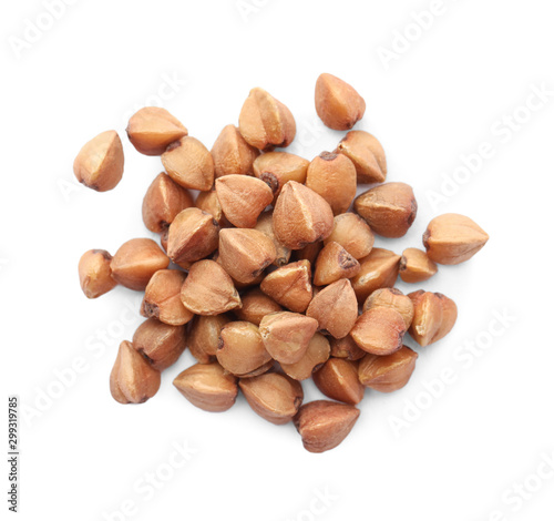 Pile of buckwheat grains isolated on white, top view. Organic cereal