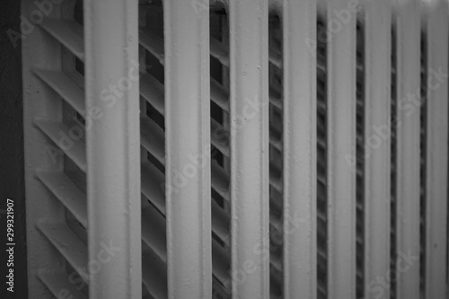 old cast iron radiator, central heating, close-up.
