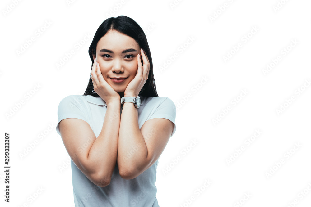 smiling pretty asian girl touching face isolated on white smiling pretty asian girl touching face isolated on white