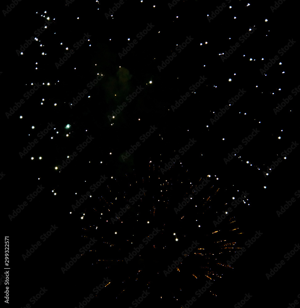 Fireworks sparkles in the night sky as background Fireworks sparkles in the night sky as background