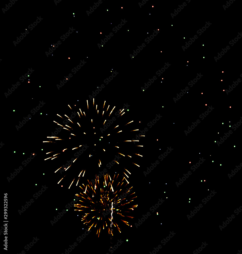 Fireworks sparkles in the night sky as background Fireworks sparkles in the night sky as background