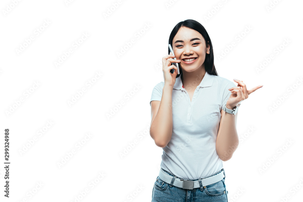 happy attractive asian girl talking on smartphone isolated on white happy attractive asian girl talking on smartphone isolated on white