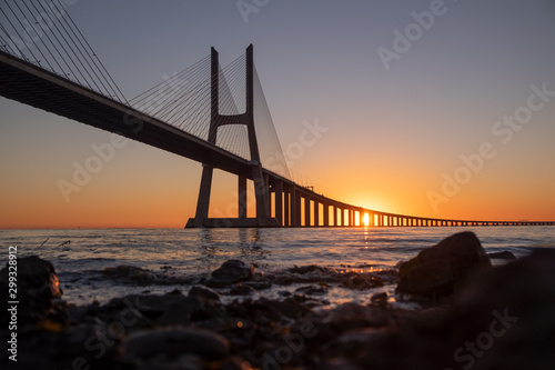 Vasco da Gama Bridge at sunrise in Lisbon, Portugal. Second longest bridge in Europe. © Tomas