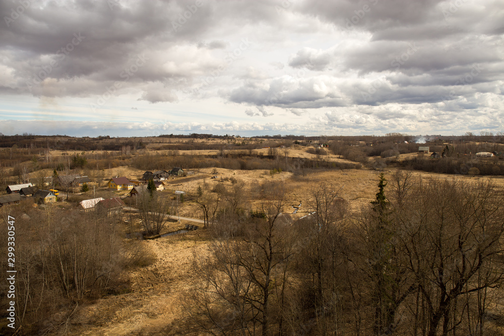 Panorama of spring landscape with hills and forests. Izborsk, Pskov region, Russia. Panorama of spring landscape with hills and forests. Izborsk, Pskov region, Russia.