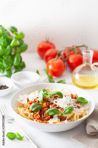 spaghetti bolognese with basil and parmesan, italian pasta